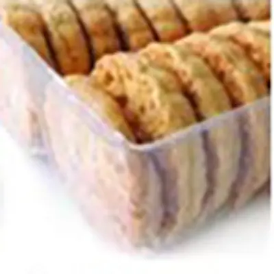 A clear plastic tray full of cookies.